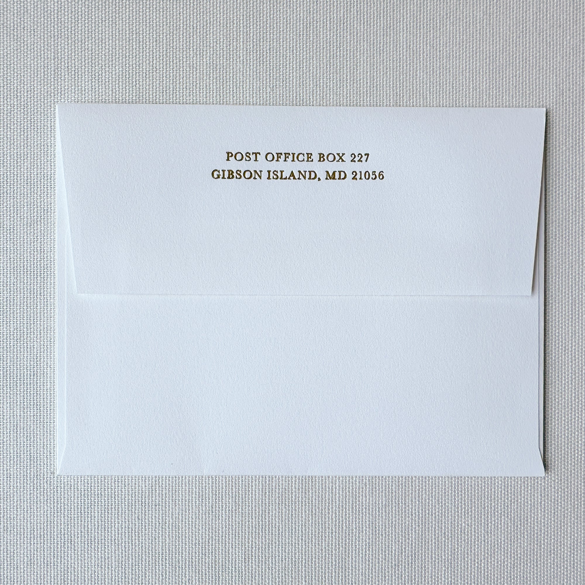 White Envelope with Gold Foil Printing